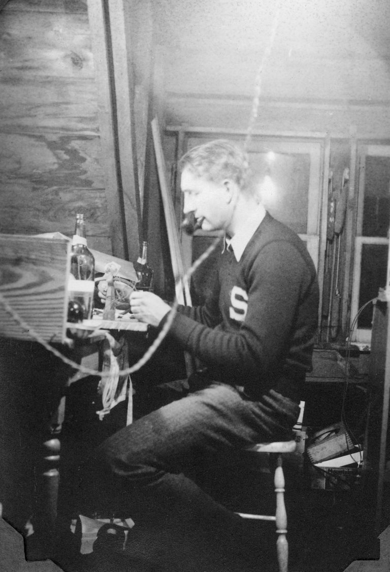 Dave Packard working at his desk.