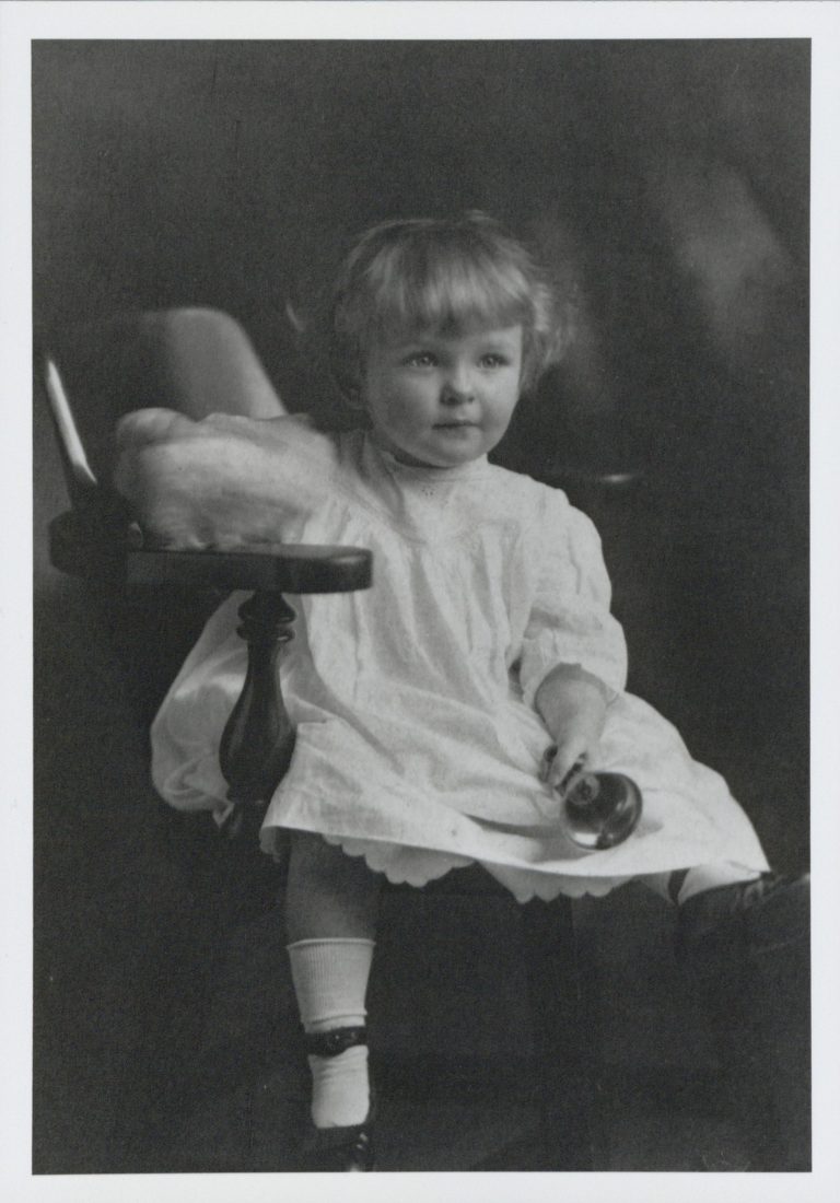 Bill Hewlett posing in a chair as a child in 1915.