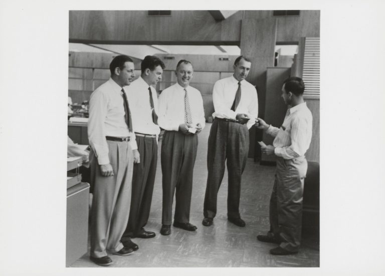 Bill and Dave chatting with Noel Porter and others in 1955.