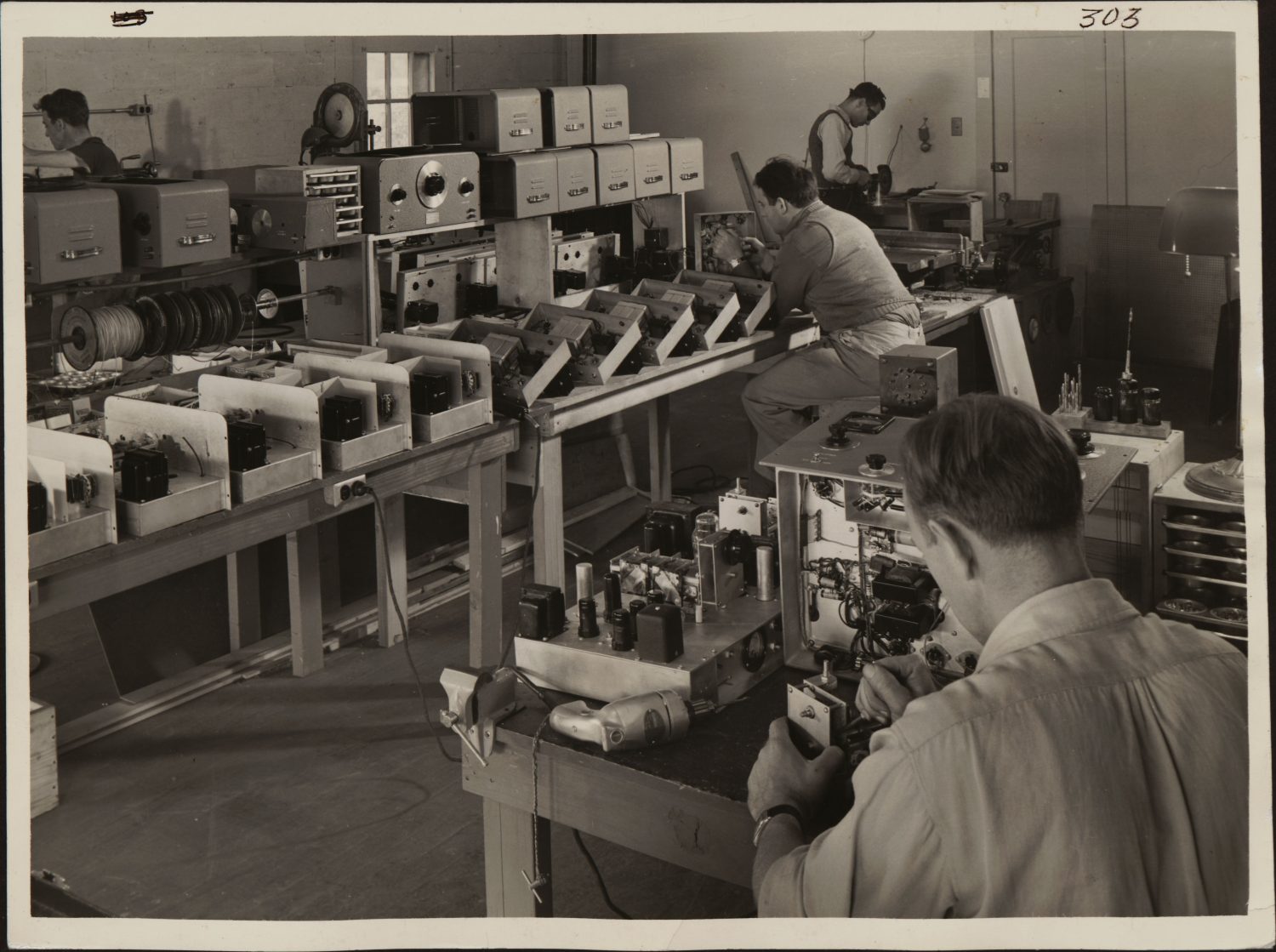 A photo from 1940 showing the use of open spaces where employees could see each other but have their own individual space.