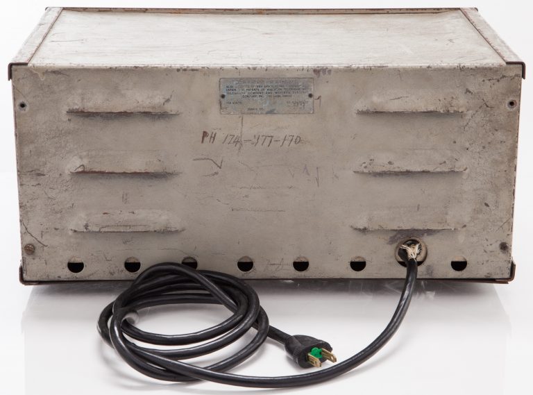 Back of the HP 200A oscillator with power cord and PH 174-177-1709 written by hand on the rear plating.