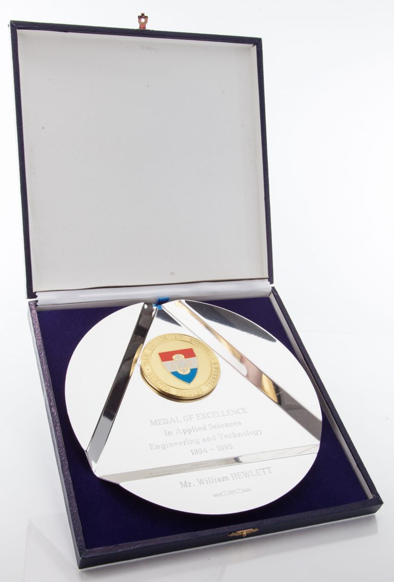 Medal of Excellence in Applied Sciences in its presentation case.