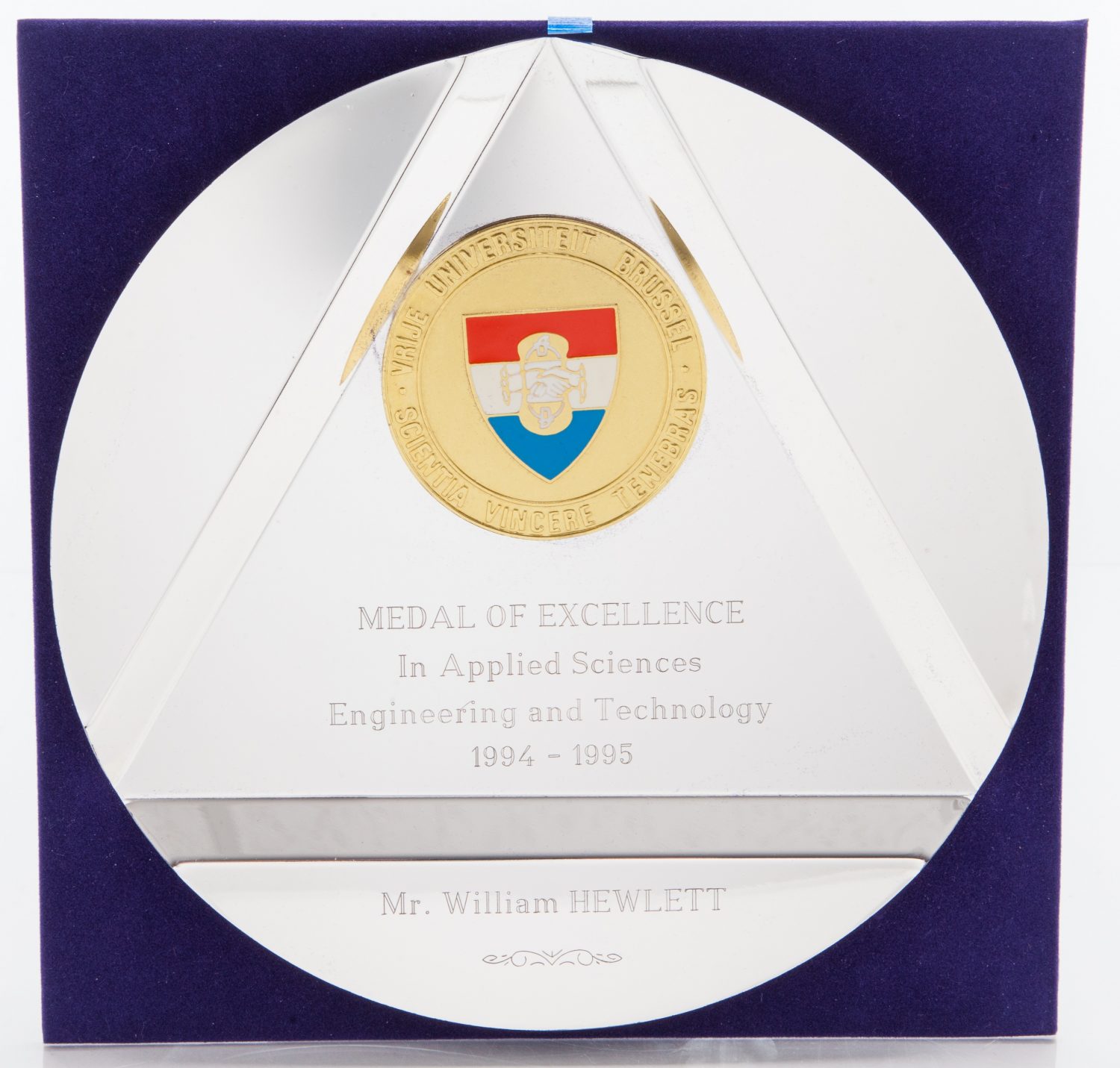 Front of the Medal of Excellence in Applied Sciences inscribed to Bill Hewlett.
