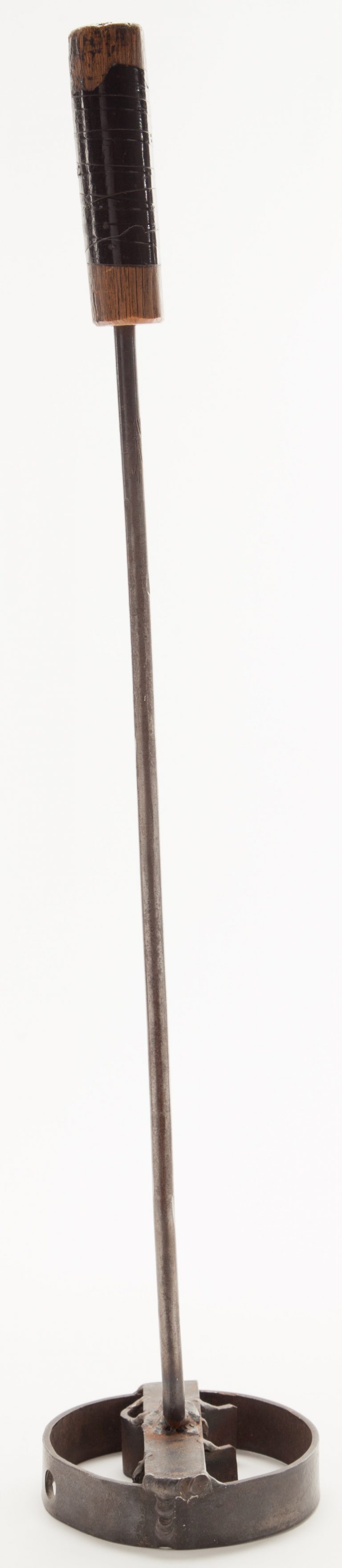 Side view of the branding iron with HP logo.