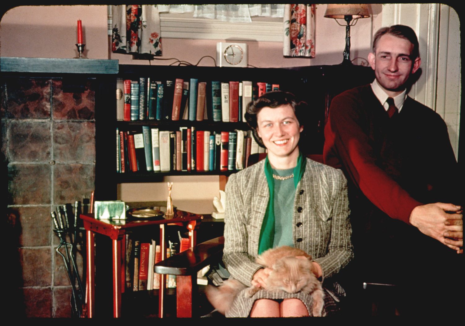 Photo of Lucile Salter Packard with a cat in her lap and Dave Packard sitting next to her.