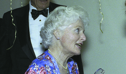 Rosemary Hewlett shaking hands with opera singer Beverly Sills.