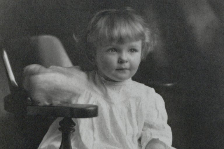 Bill Hewlett posing in a chair as a child in 1915.