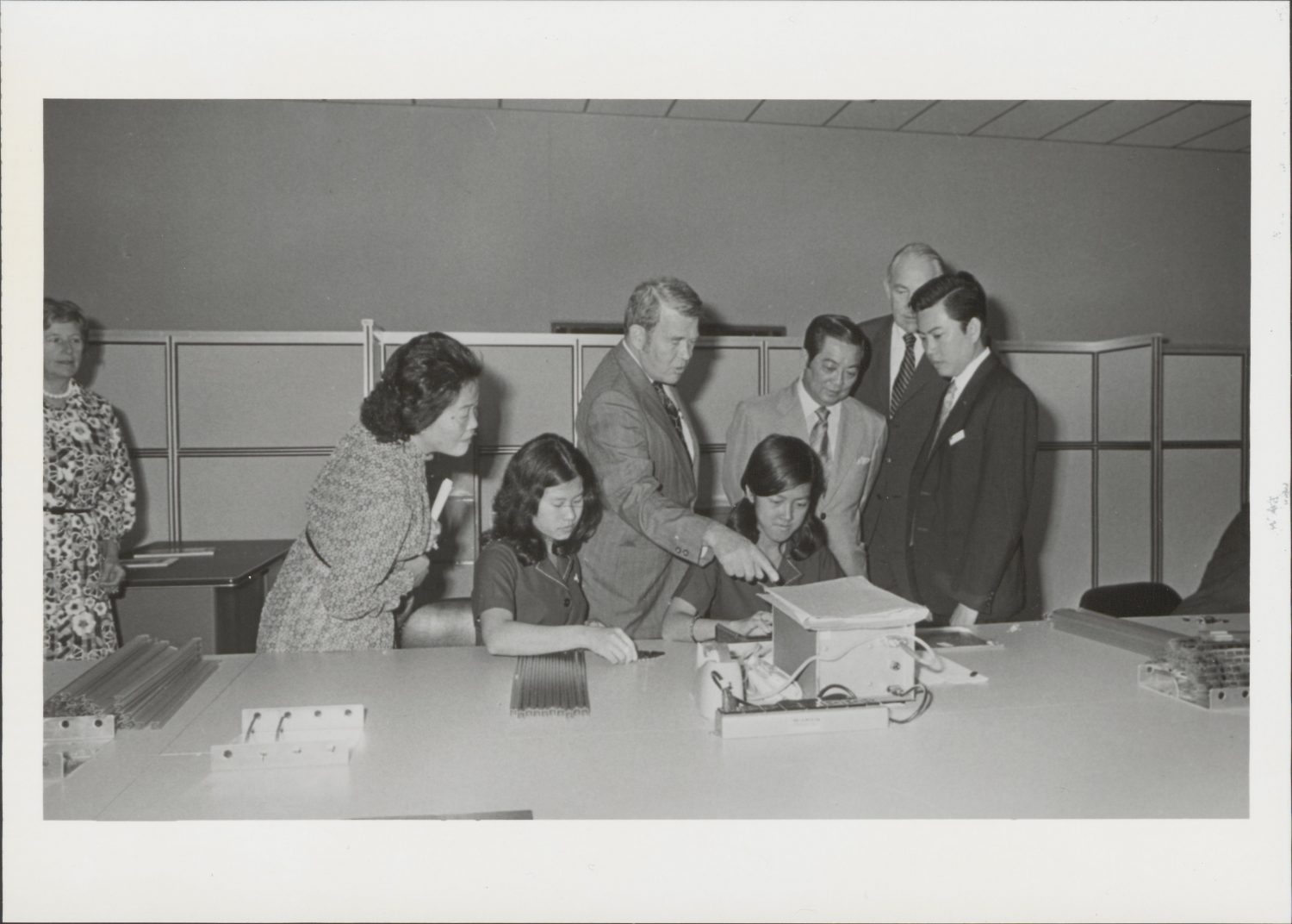 Hewlett and Packard speaking with employees in the 1970s.