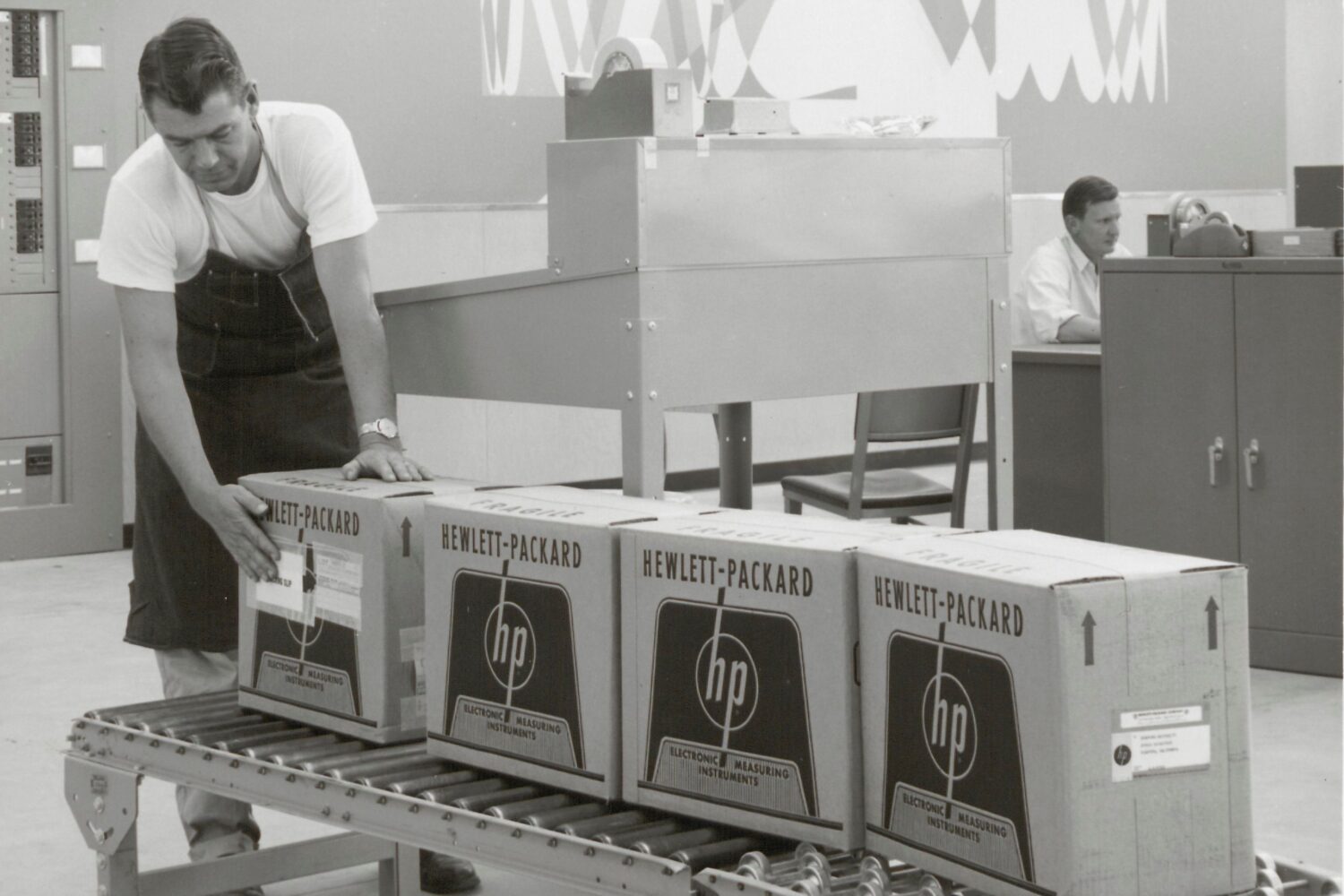 Early packaging for Hewlett-Packard featuring the company logo and the phrase Electronic Measuring Instruments.