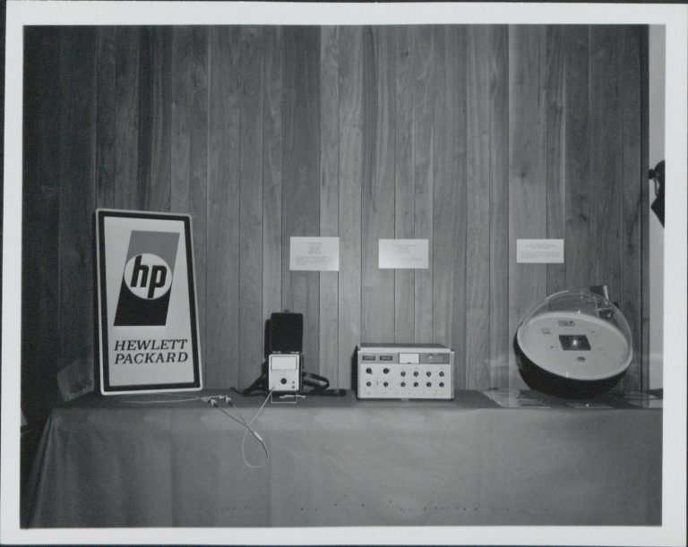 HP's 1967 logo. The letters h & p sit inside a circle with shading above/below and Hewlett and Packard spelled out at bottom.