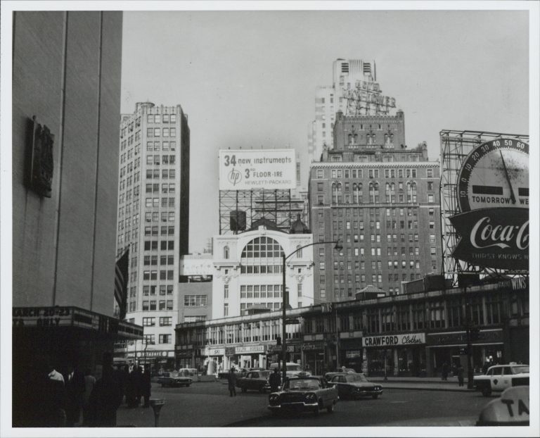 Photo of a billboard indicating 34 new instruments featured by HP on 3rd floor of the IRE in 1957.