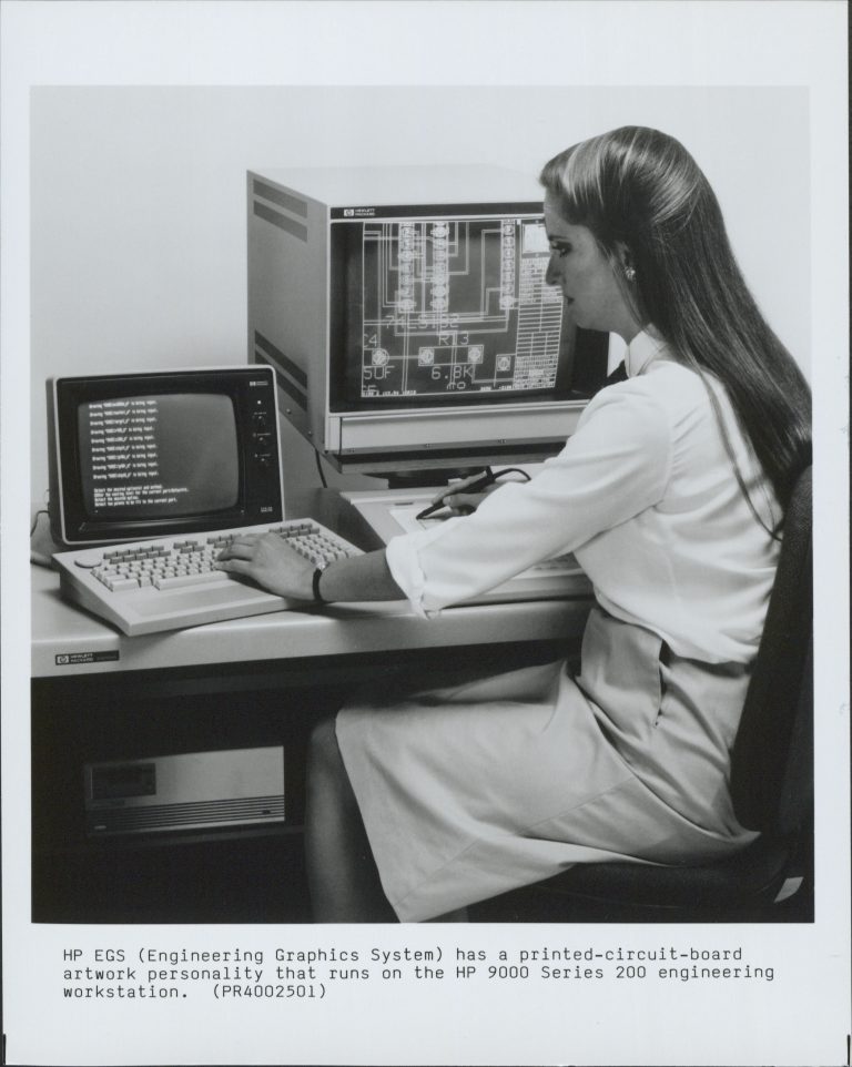 Woman working with HP's Engineering Graphics System software on an HP 9000 Series 200 engineering workstation computer.