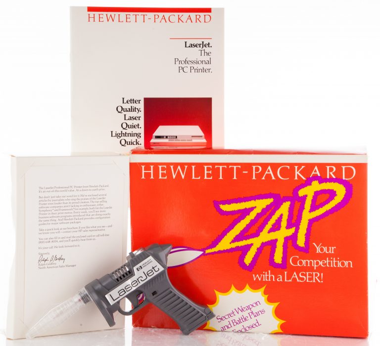 Toy laser gun and associated materials promoting HP's LaserJet technology.