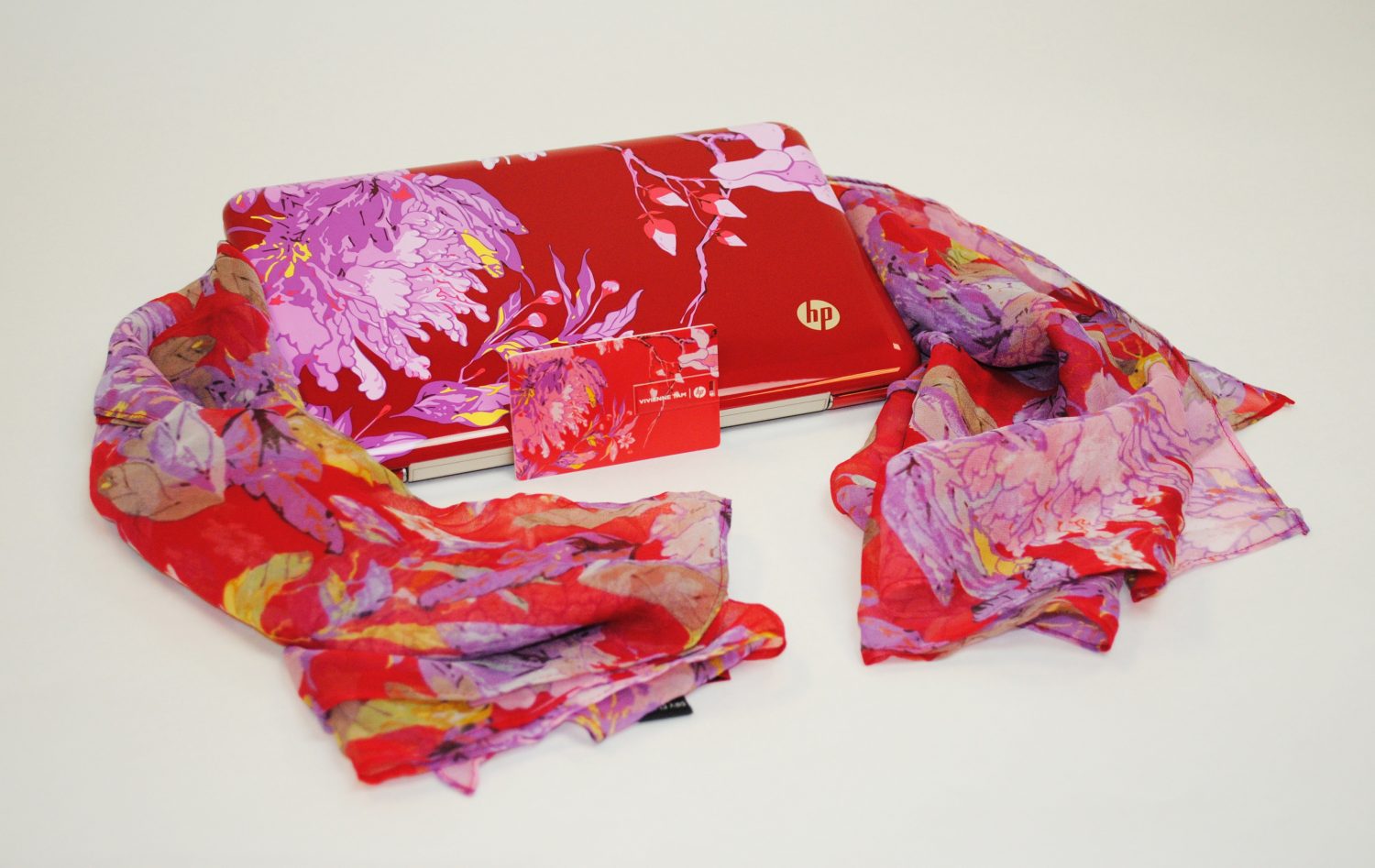 The Hewlett-Packard mini laptop designed by Vivienne Tam with a matching scarf.