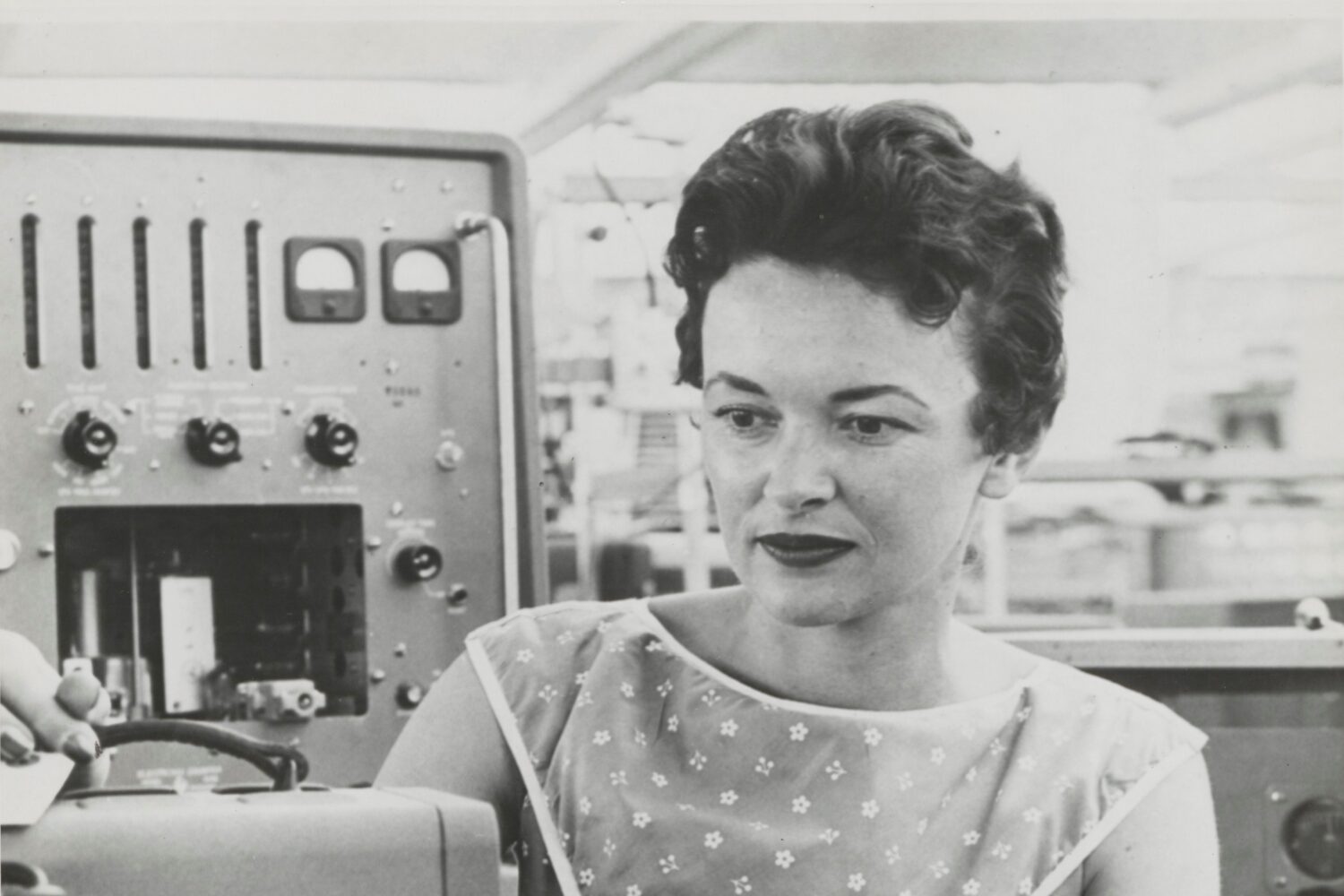 A woman assembling a Hewlett-Packard oscillator in the 1950s or 1960s.