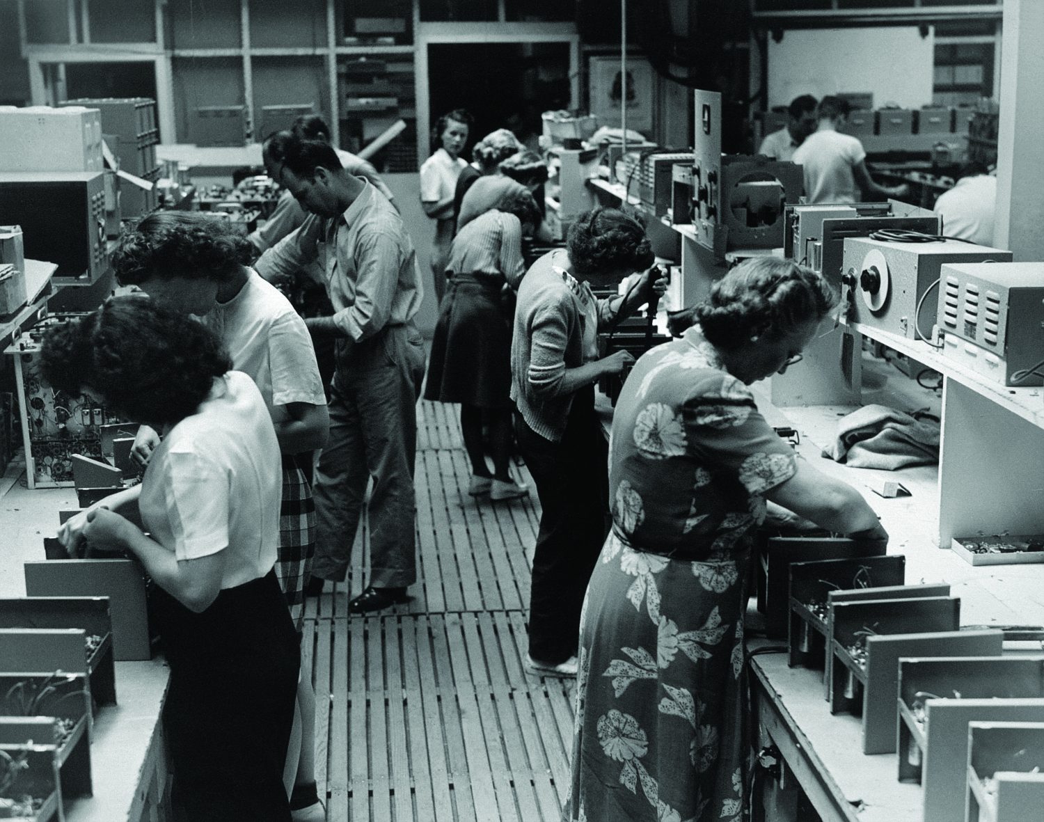 Hewlett-Packard employees working on the pass-on assembly line in 1946.