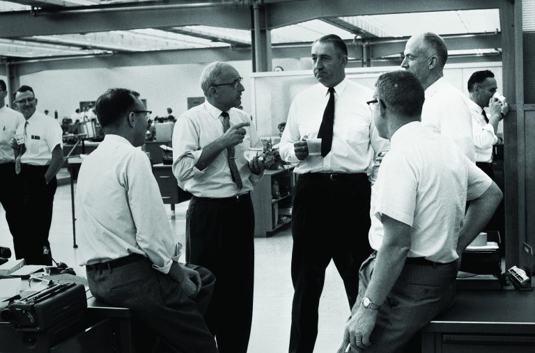 Dave Packard chats with HP employees during a coffee break.