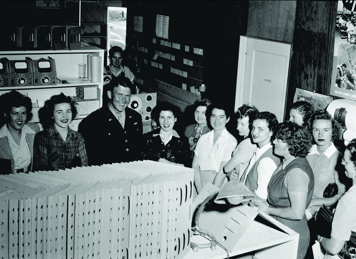 Bill Hewlett with a number of female employees during a visit to HP in 1944 when he was a major in the Army.