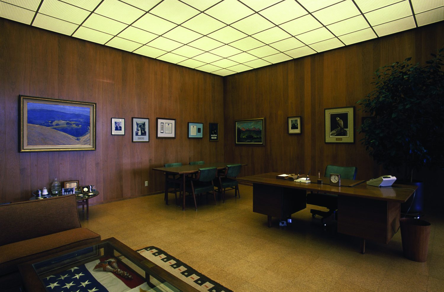 A photo of Dave Packard's preserved office at 1501 Page Mill Road with wood panel walls and original furniture and décor.