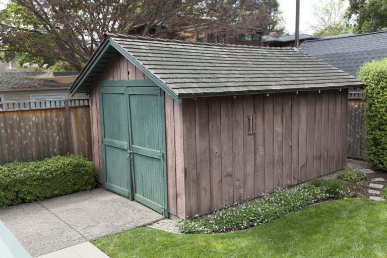 Exterior photo of the restored garage at 367 Addison Avenue taken in 2016.