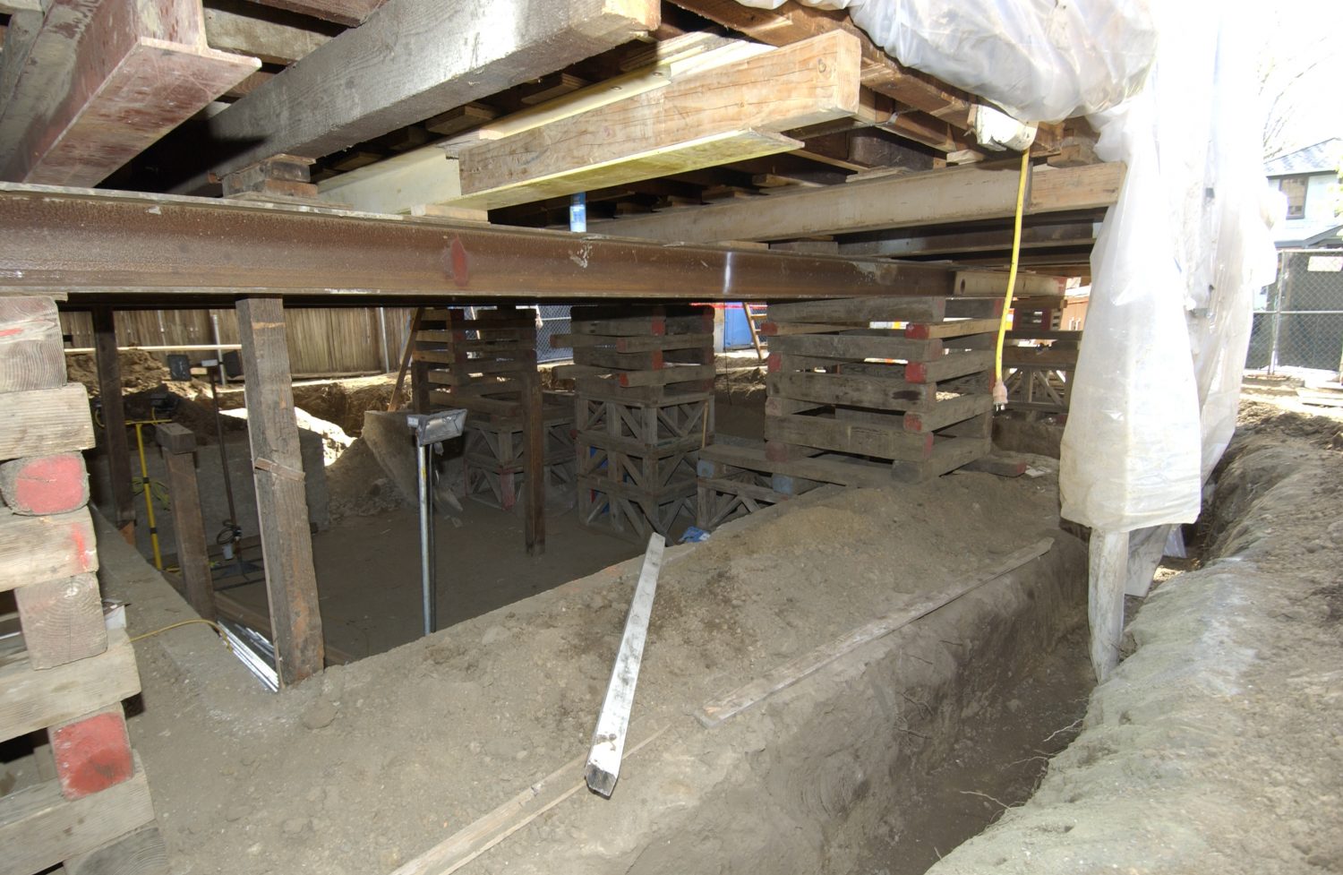 A view of the supports added while repairs were completed on the foundation of the main house on Addison Avenue.