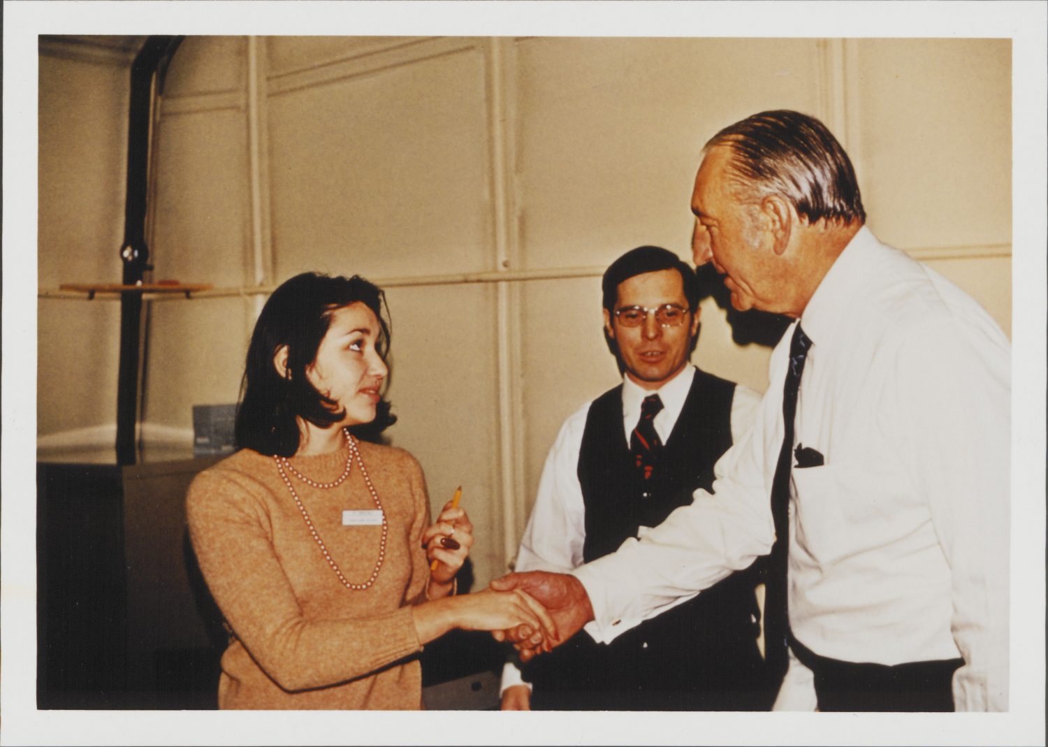 Dave Packard speaking with a female employee in the 1960s.