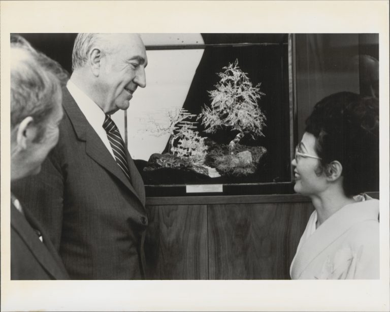 Kyoko Sagimori of Hewlett-Packard's Santa Clara division speaks with Dave and Bill in front of the glass bonsai tree.