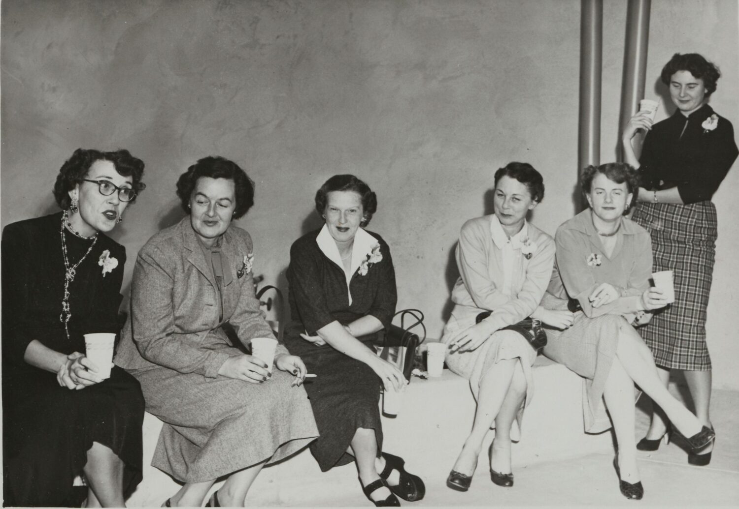 A group of six women celebrating Hewlett-Packard's 15th anniversary.