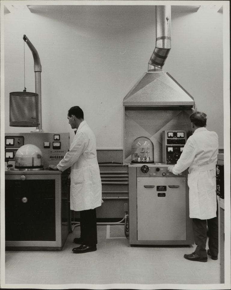 Two researchers working in a lab at Hewlett-Packard's Page Mill Road facility.