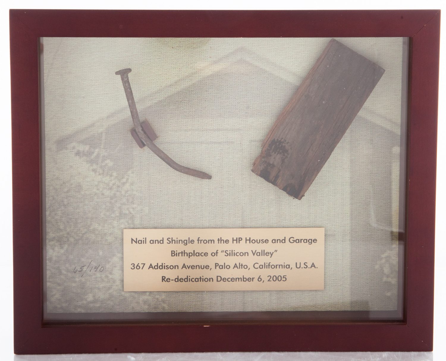 Framed nail and shingle from the HP House and Garage on Addison Avenue with plaque.