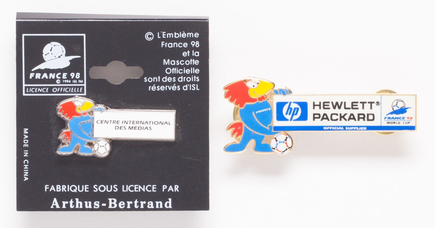 A pin including the Footix mascot recognizing Hewlett-Packard as an official supplier of the 1998 World Cup in France.