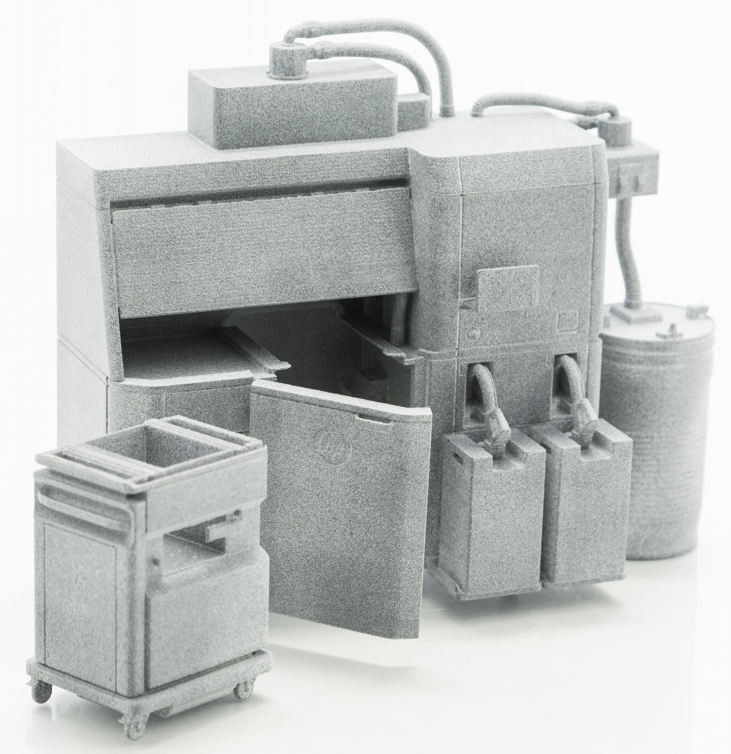 A 3D-printed model of an HP 3D printing system including tanks, connectors and cart.