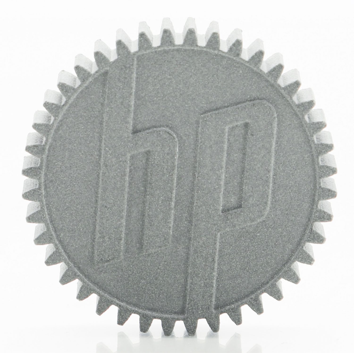 The HP logo embossed on a 3D-printed plastic gear.