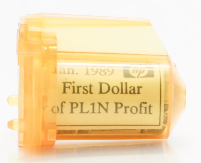 An unused inkjet cartridge holding the first dollar Hewlett-Packard's PL1N line brought in.