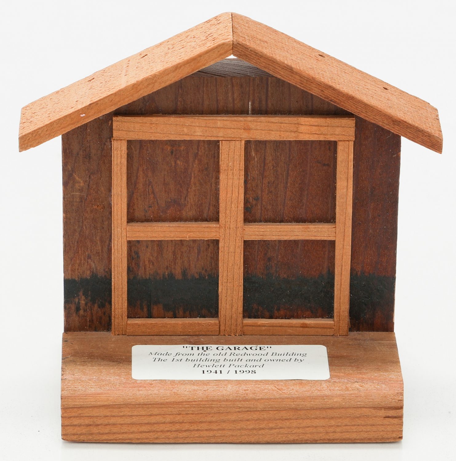 A miniature representation of the Addison Avenue garage made from wood reclaimed from HP's Redwood Building.