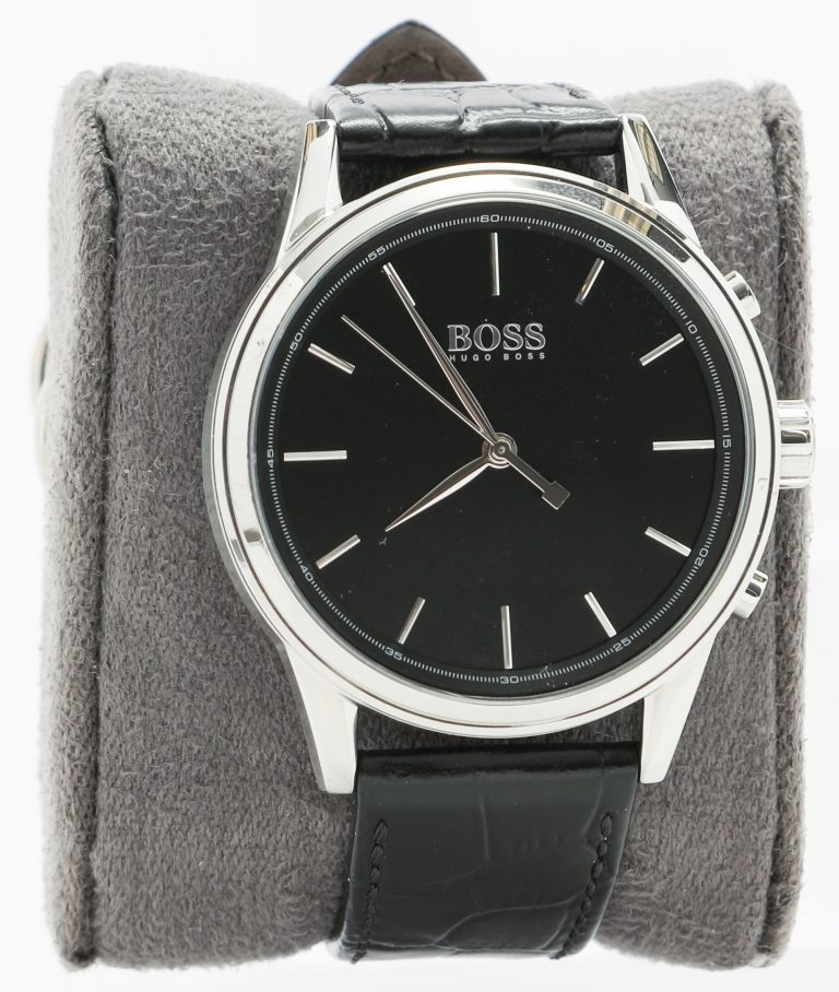 Smartwatch produced by Hugo Boss with HP technology. It features black band and watch face with silver accents and frame.