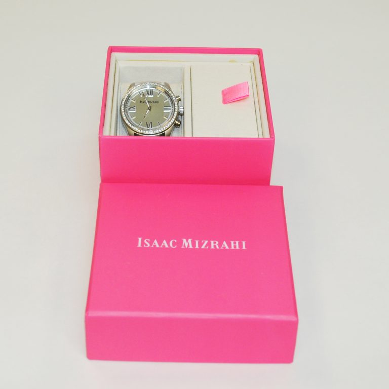 Photo of Isaac Mizrahi smartwatch featuring HP technology and Swarovski crystals in a pink display box.