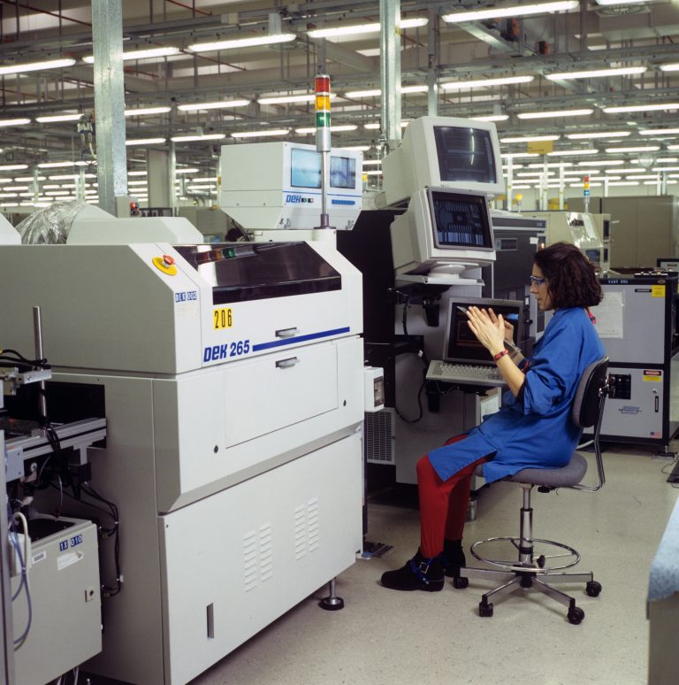 A woman working at HP's production site in Bergamo, Italy.