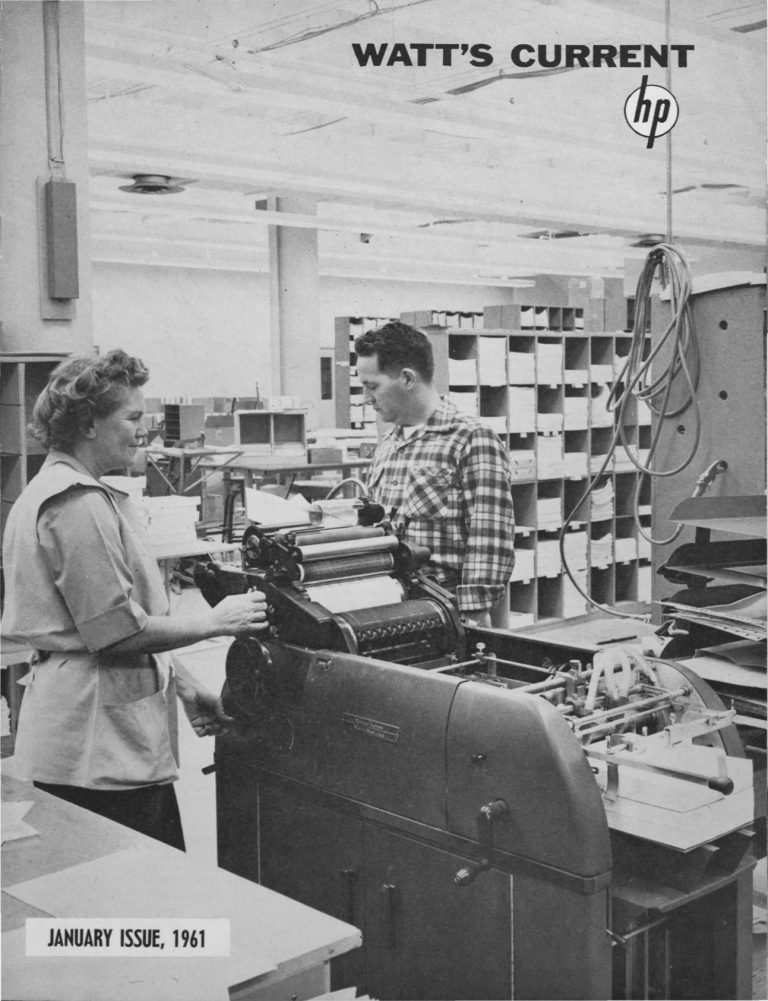 The cover of Watt's Current from January 1961 with Patrica Vogt & Wally Brann working on a Dressagraph Multilift Model 1275.