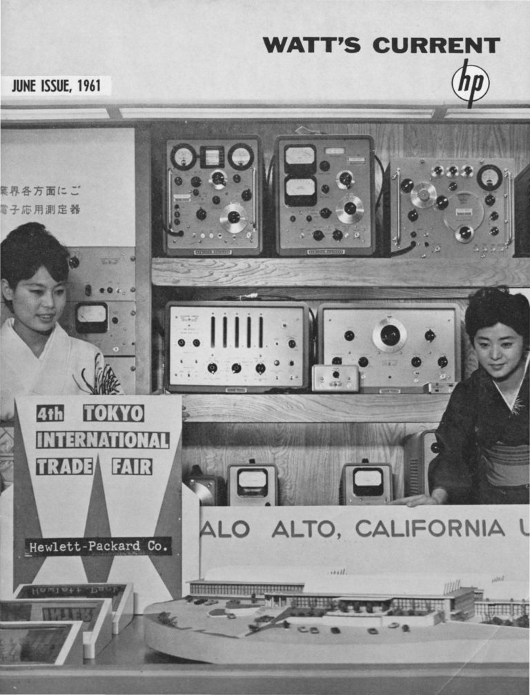 Two women working the Hewlett-Packard exhibit at the Fourth Tokyo International Trade Fair.