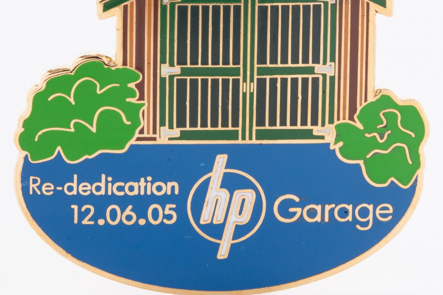 Commemorative pin depicting the Addison Avenue garage and reading Re-dedication 12.05.05 hp garage.