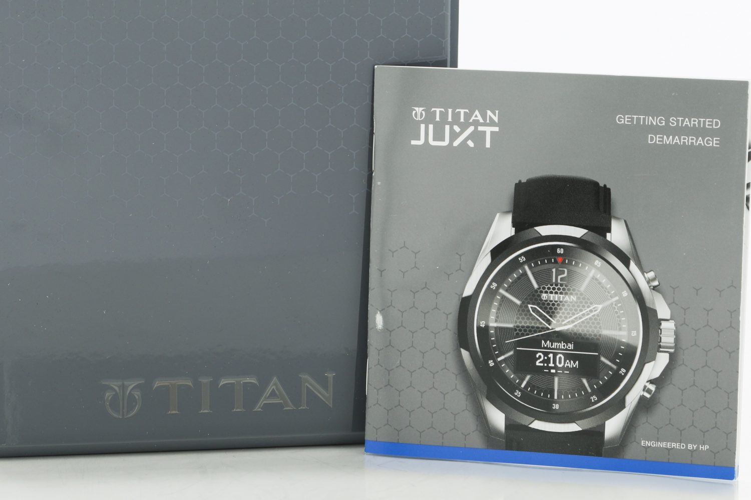 Box and manual for the Titan Juxt wristwatch engineered by HP.