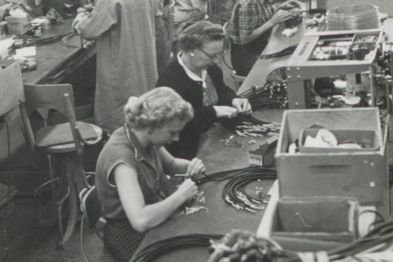 Photo of many women on Hewlett-Packard's production line in the 1940s or 1950s.