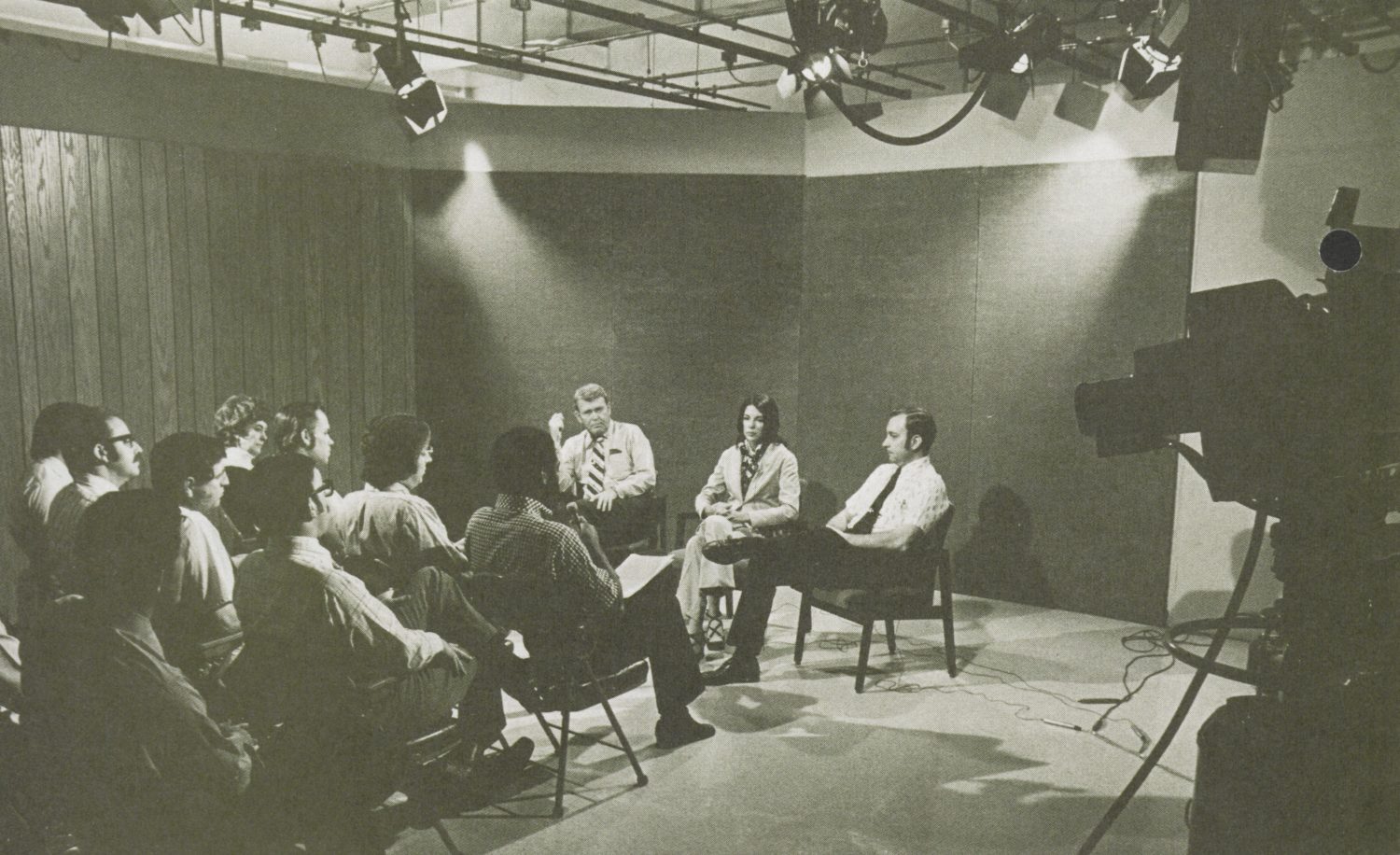 Bill Hewlett, Linda Standley and Paul Ely attending an employee meeting in 1974.