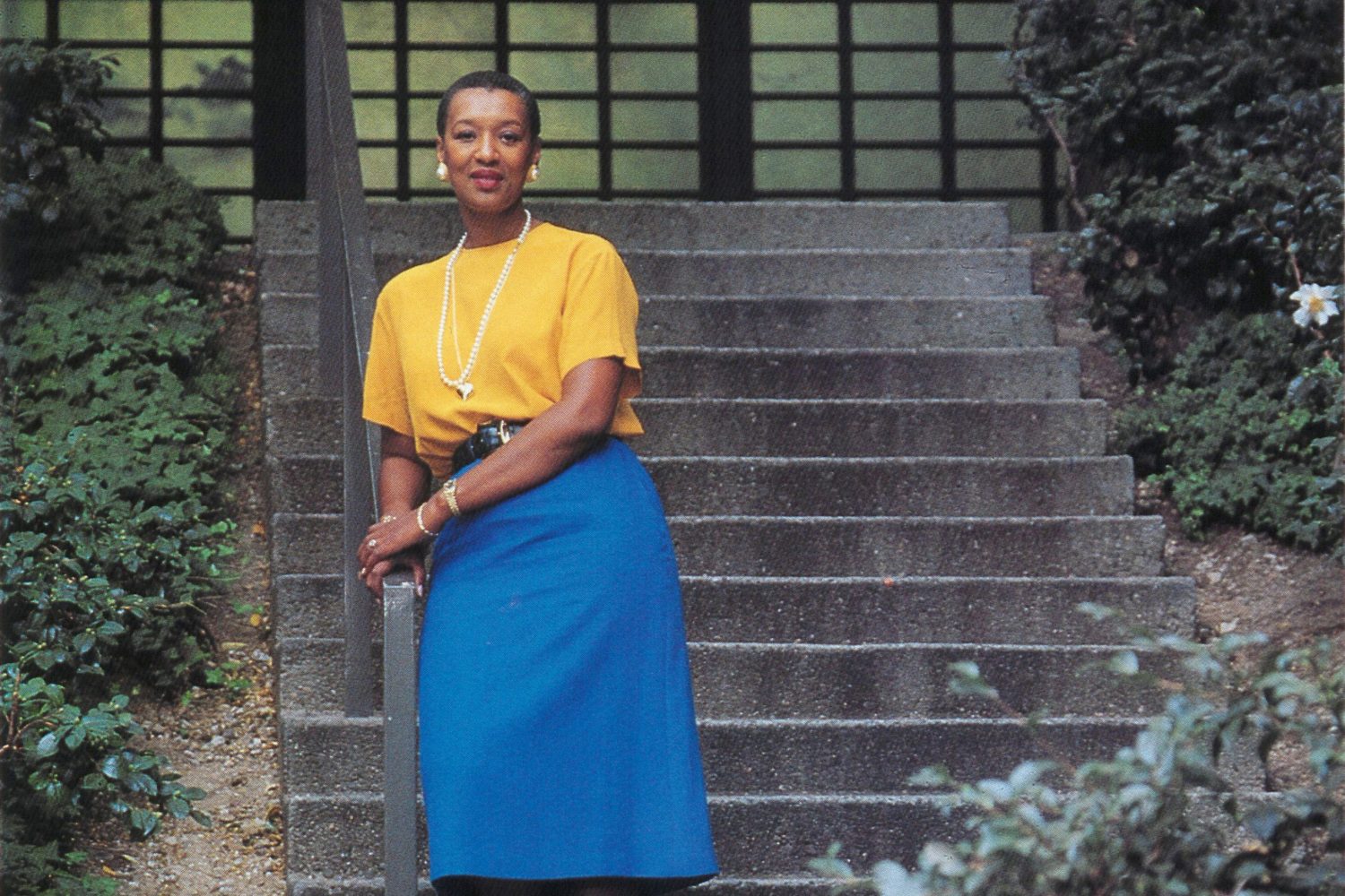 Emily Duncan standing at the bottom of an outdoor staircase in an image dated 1993.