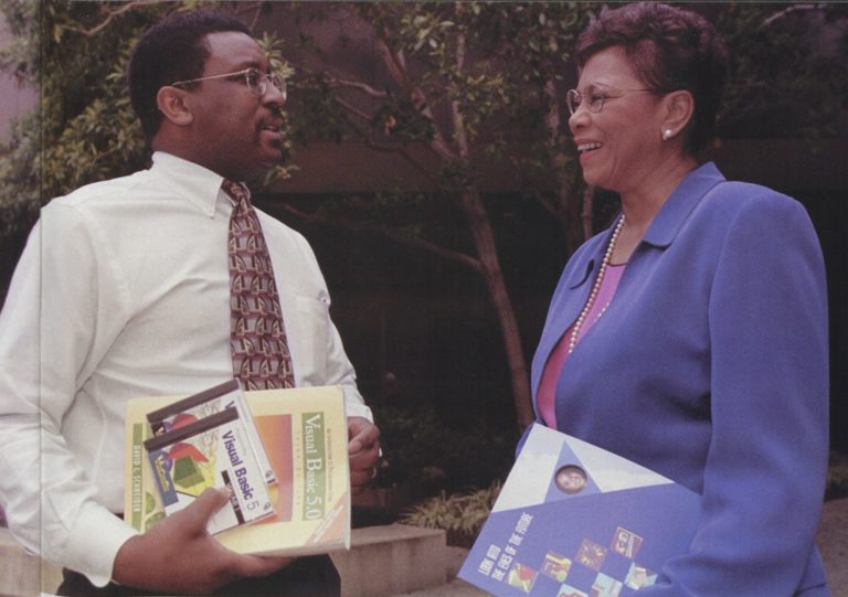 Photo of Bess Stephens (right) and Kevin Hinkston (left), both honored at the Black Engineer of the Year Awards Conference.